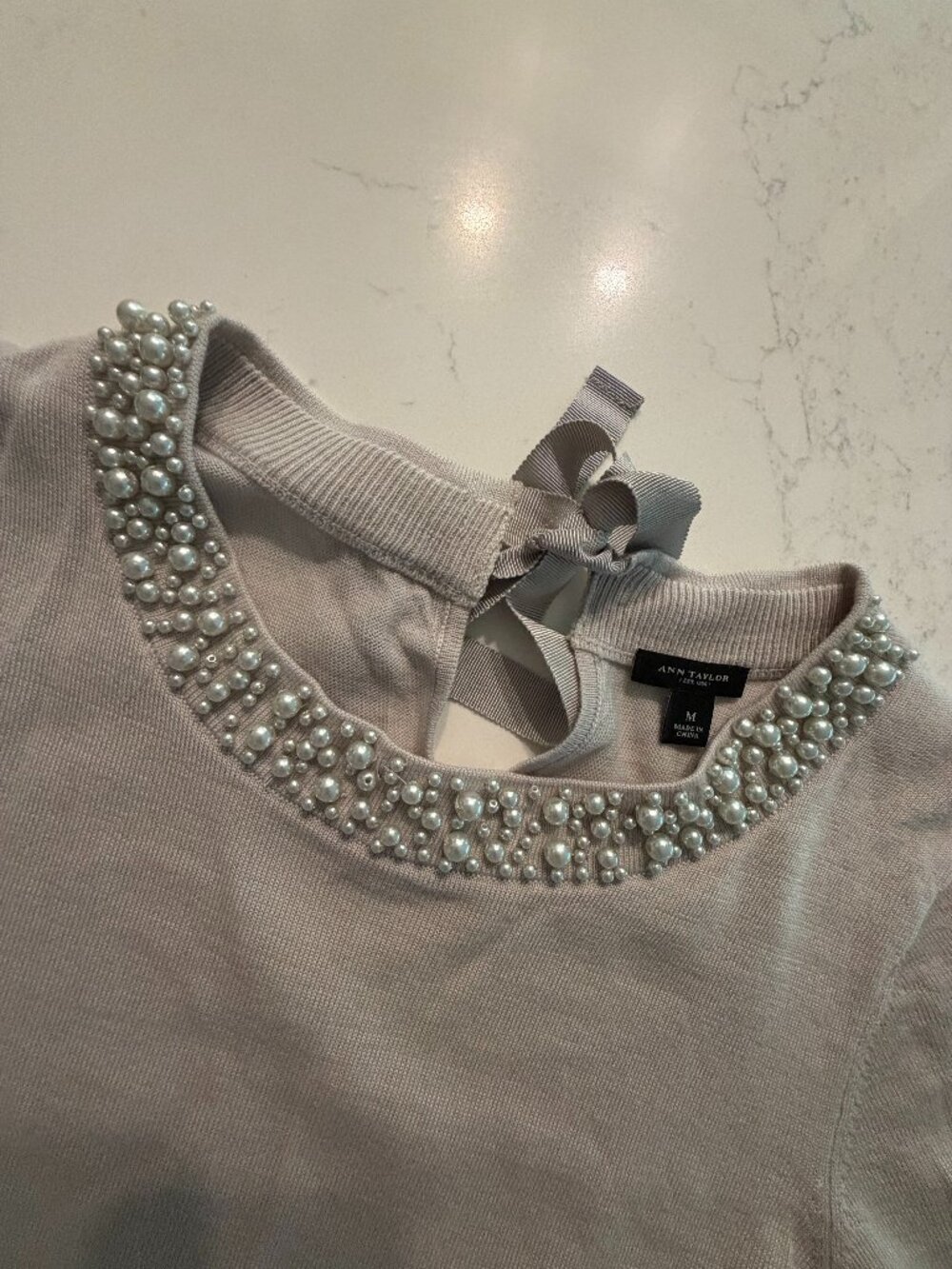 Ann Taylor Medium Pearl Merino Wool sweater with bow tie